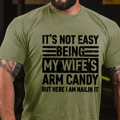 Men's It's Not Easy Being My Wife's Arm Candy But Here I'm Nailing It T-Shirt